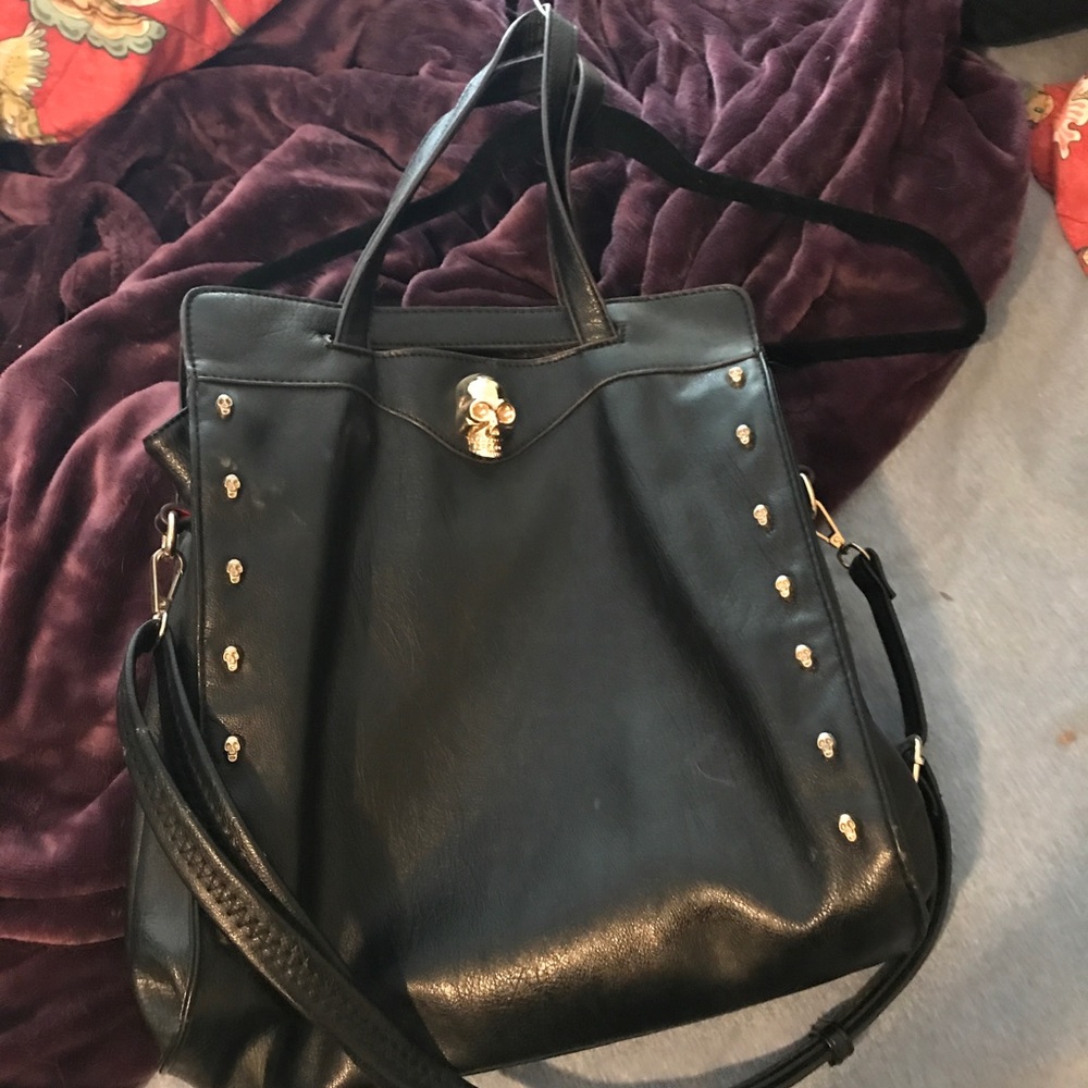 Black and gold skull purse